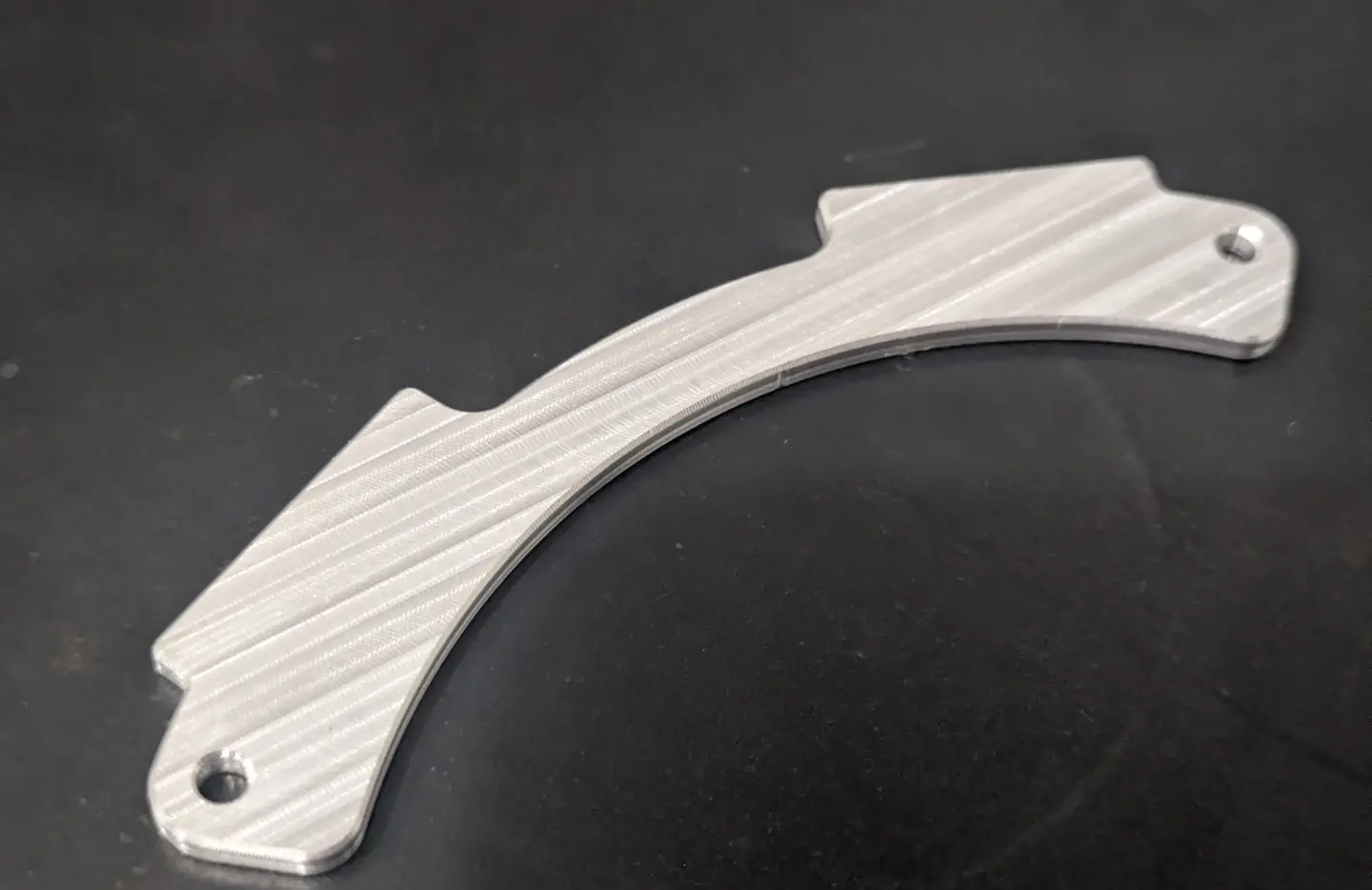 Curved machined component
