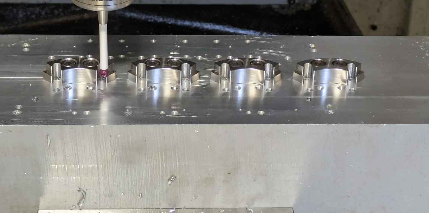 Inspection probe over machined components